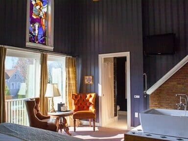 comfy chairs in front of window